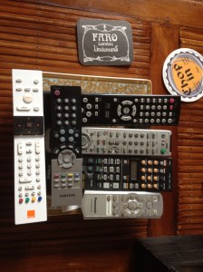 These remote controls work the living room entertainment system. Pretty obvious that a man owns this apartment. 