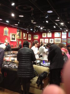 Drouot inside one of the many rooms full of auction items (and part of my thumb in the photo). 
