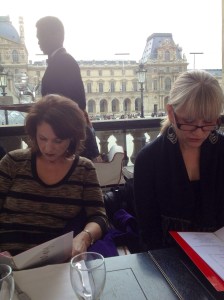 Joan and Barb at Marly restaurant with the Louvre behind them. 