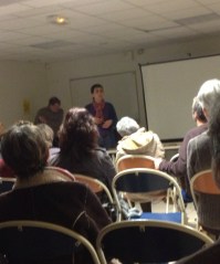 Isabelle speaking at a conference on medical hypnosis. 