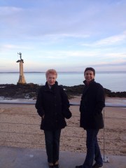Claudine and Isabelle at St Lazaire. The bronze statue in the sea is a tribute to the alliance between France and America during the two World Wars. 